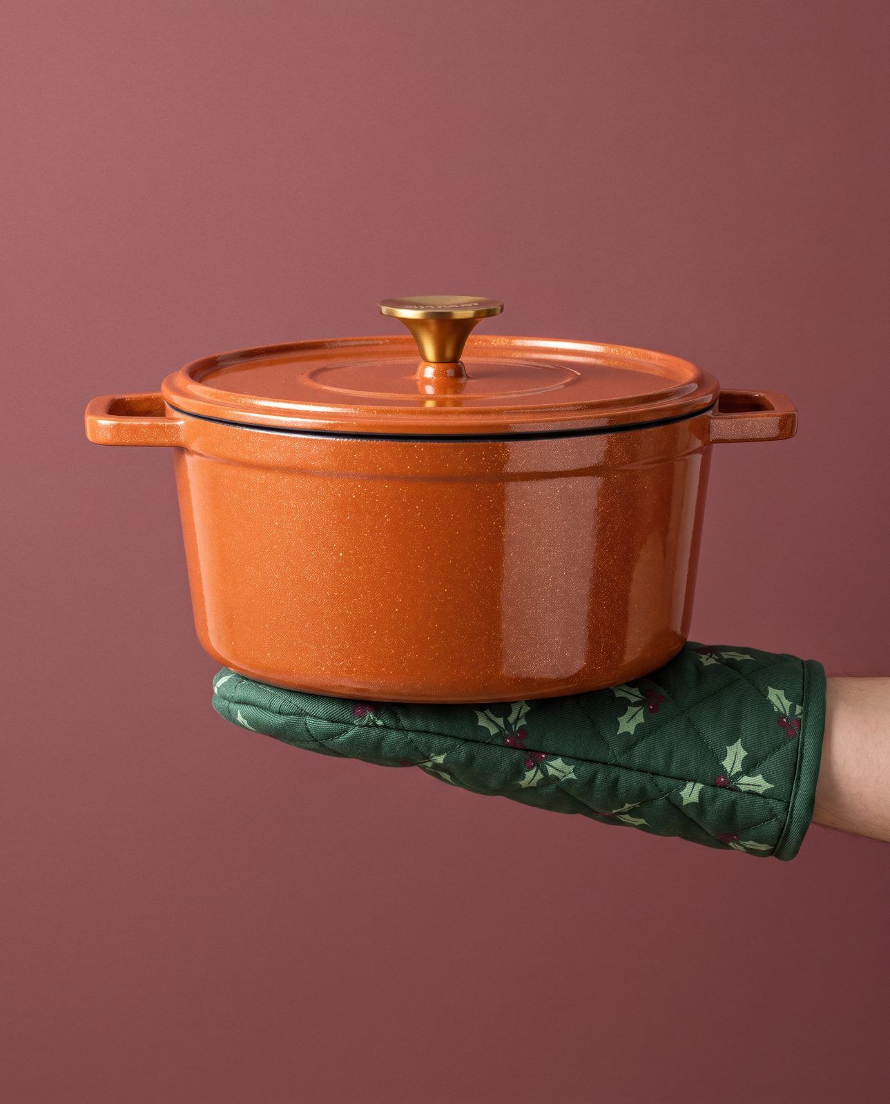 Cocotte Paillettes portée avec un gant de Noël