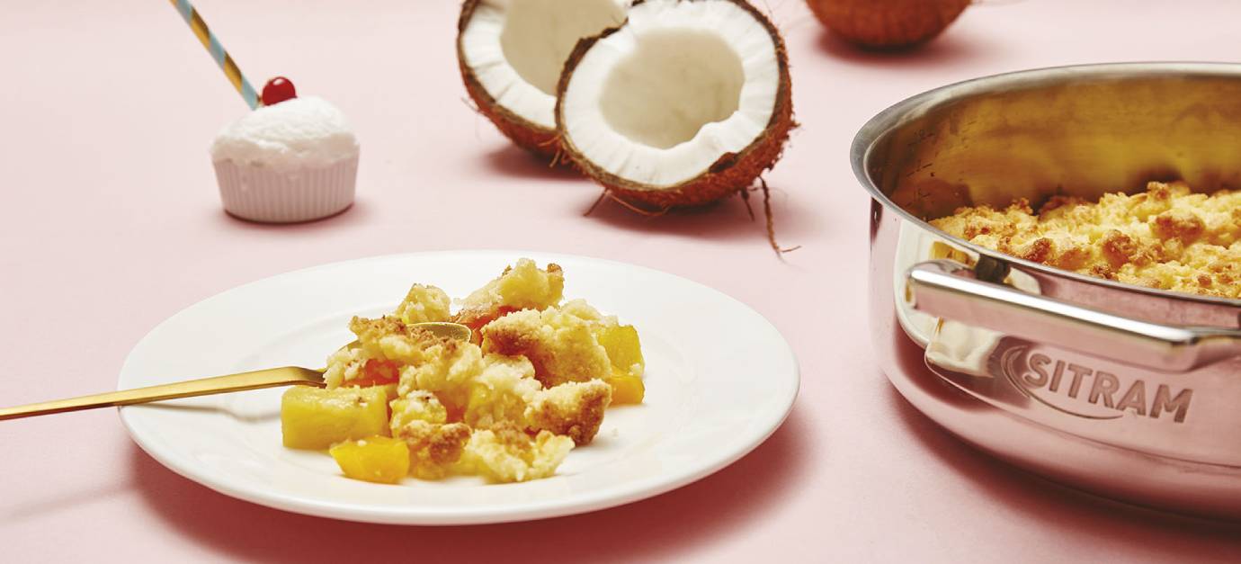 SITRAM recipe for tropical crumble with mango, pineapple, and coconut